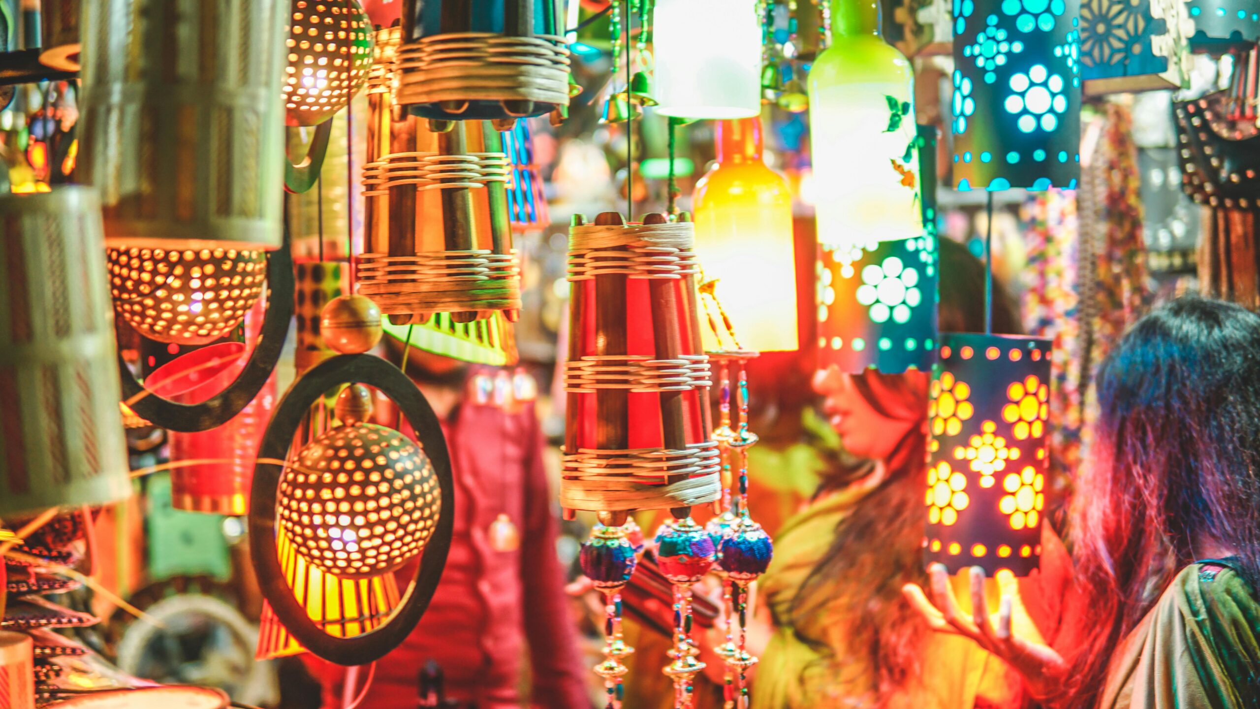 pexels photo 1033202 1033202 Colorful handmade lanterns at a vibrant festival market showcasing cultural crafts.