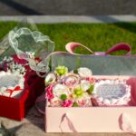Beautifully packaged floral gift boxes with elegant decorations for special occasions.
